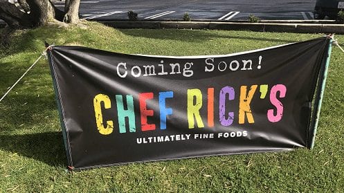 A banner outside the building at 135 E. Foster Rd. shows Chef Rick's is coming soon. (KSBY photo)